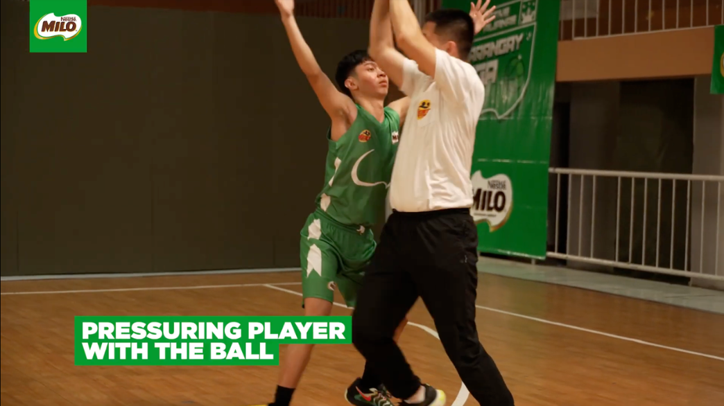 Pressuring the player with the ball